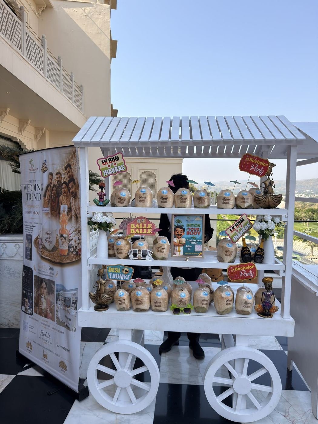 Mr. Coconut CocoCart with personalised coconuts at a terrace event