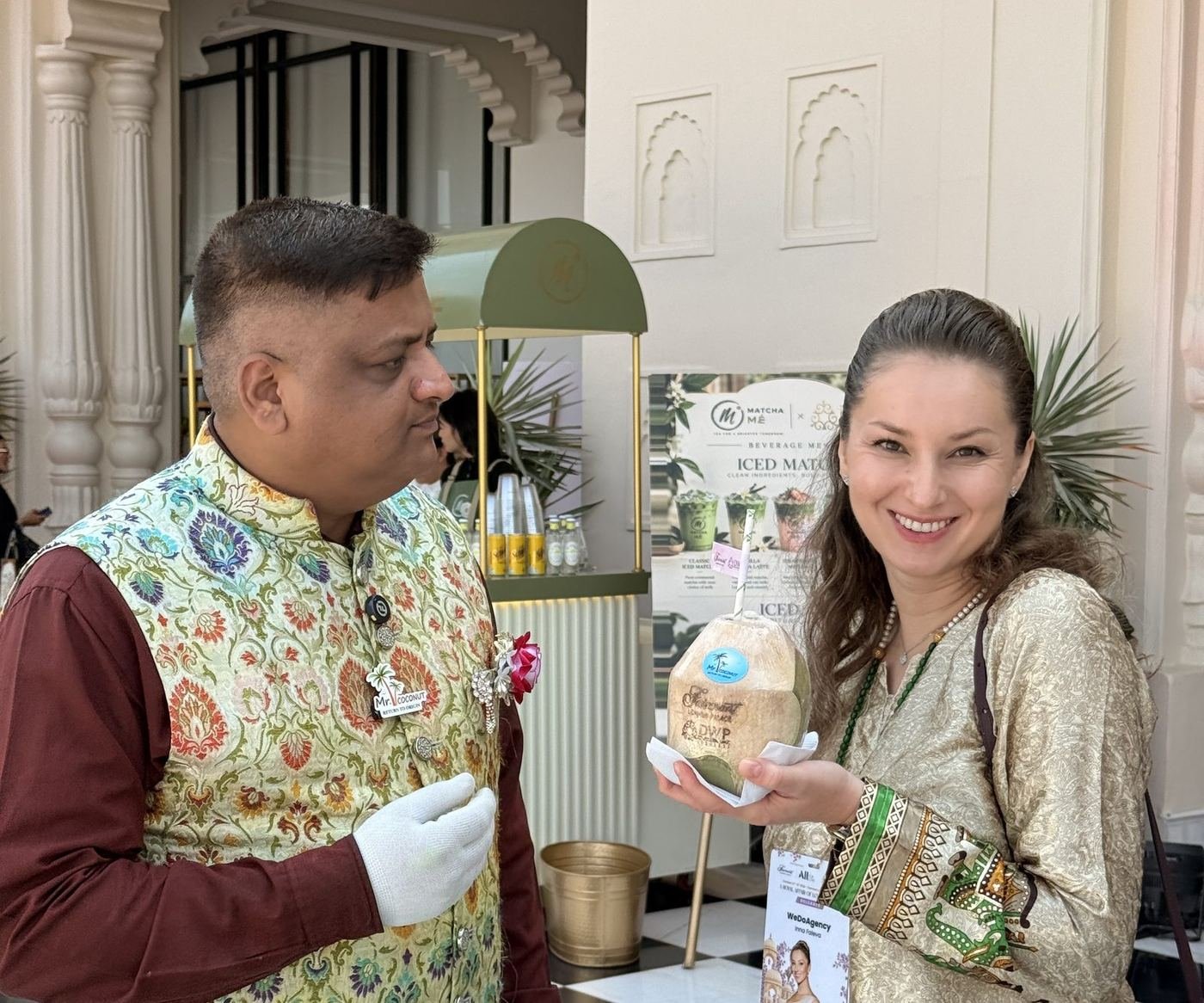 Guest posing with a Mr. Coconut personalised coconut